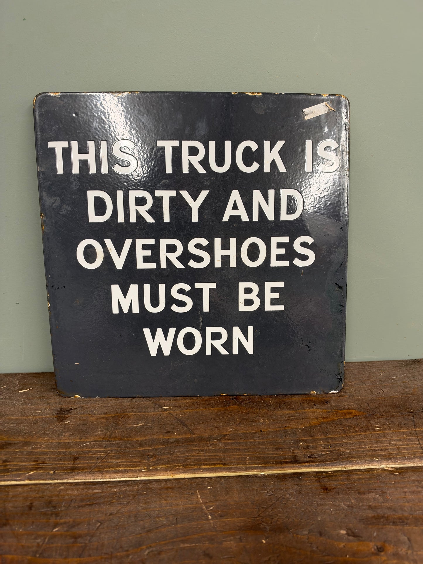 SHOES IN TRUCK ENAMEL SIGN #9457