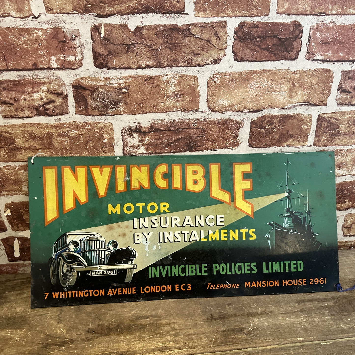 INVINCIBLE MOTOR INSURANCE SIGN #7461 image 0